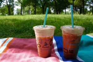 Caribou Iced Coffee on picnic blanket