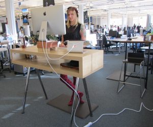 woman at a standing desk